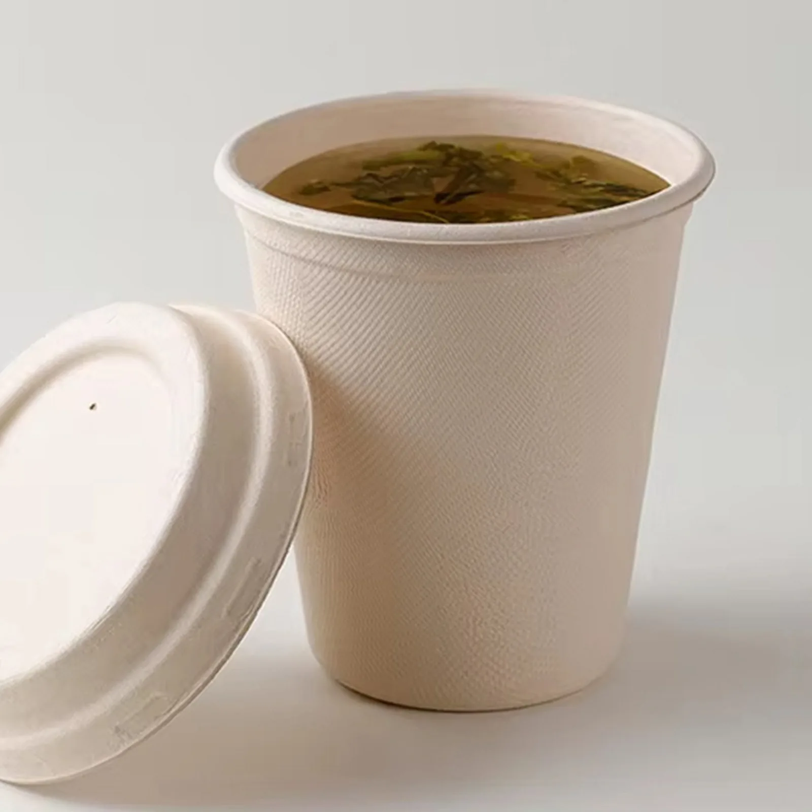 Compostable bagasse cups and lids for hot and cold beverages